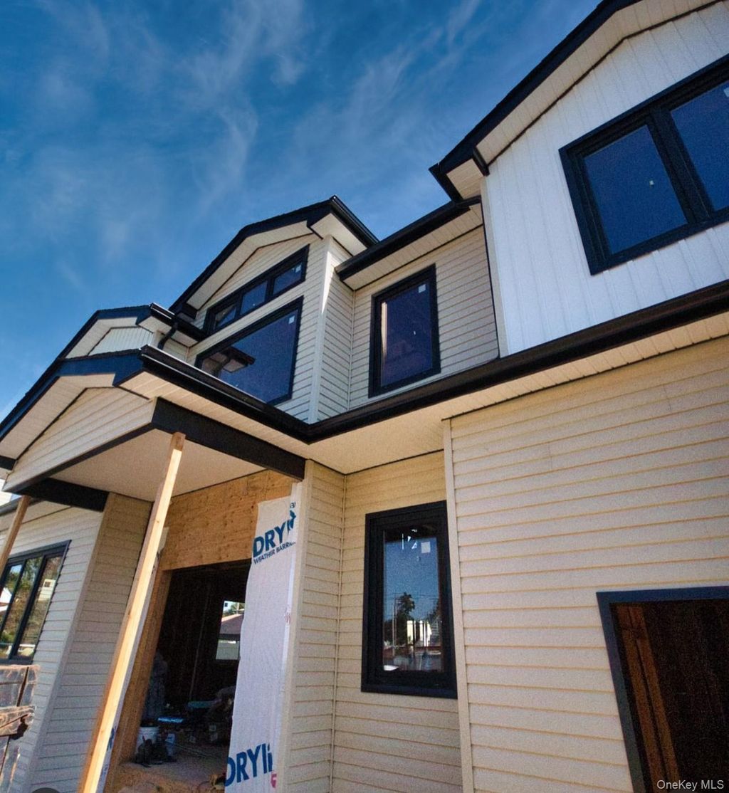 Photo of 53 Blackbird Lane, Levittown, NY 11756 (MLS # 960995)