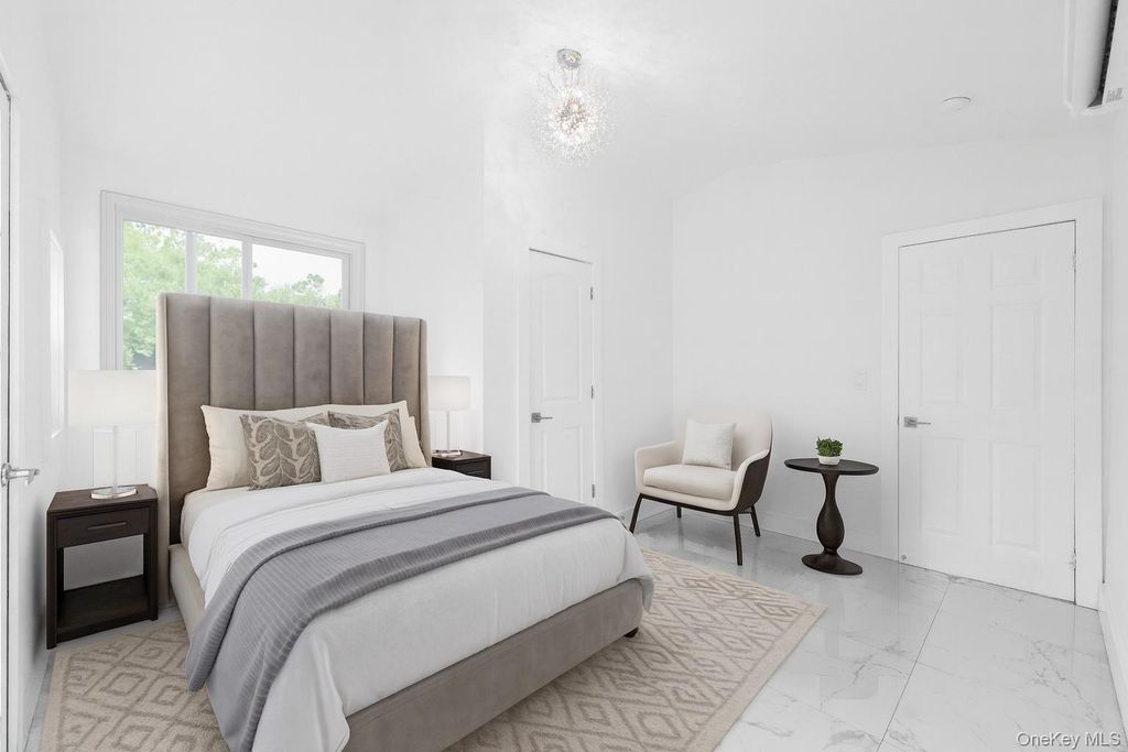 Photo of 11619 141st Street, Jamaica, NY 11436 (MLS # 942406)