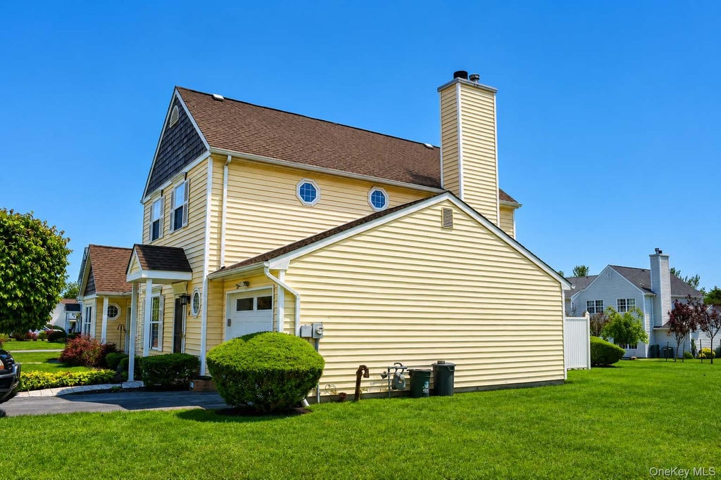 Photo of 6 Dove Path, Coram, NY 11727 (MLS # 1008004)