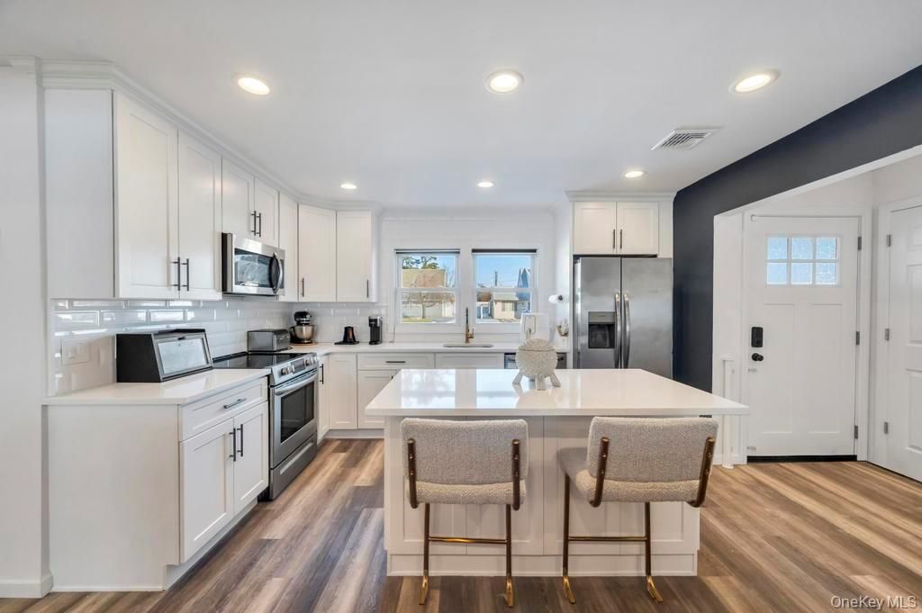 Photo of 10 Petal Lane, Hicksville, NY 11801 (MLS # 956331)