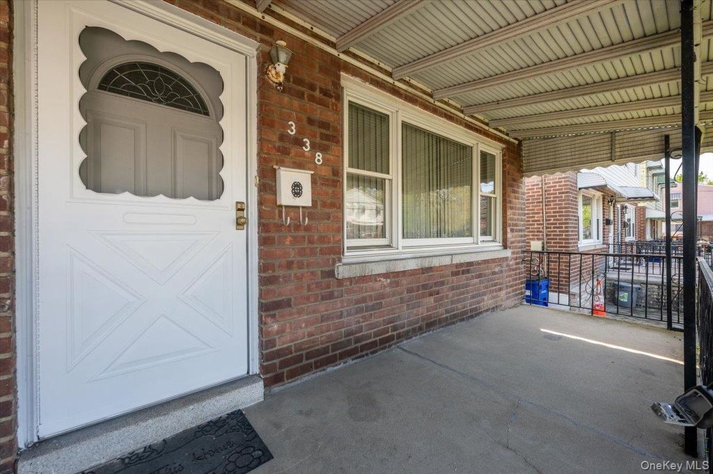 Photo of 338 Pennyfield Avenue, Bronx, NY 10465 (MLS # 990234)