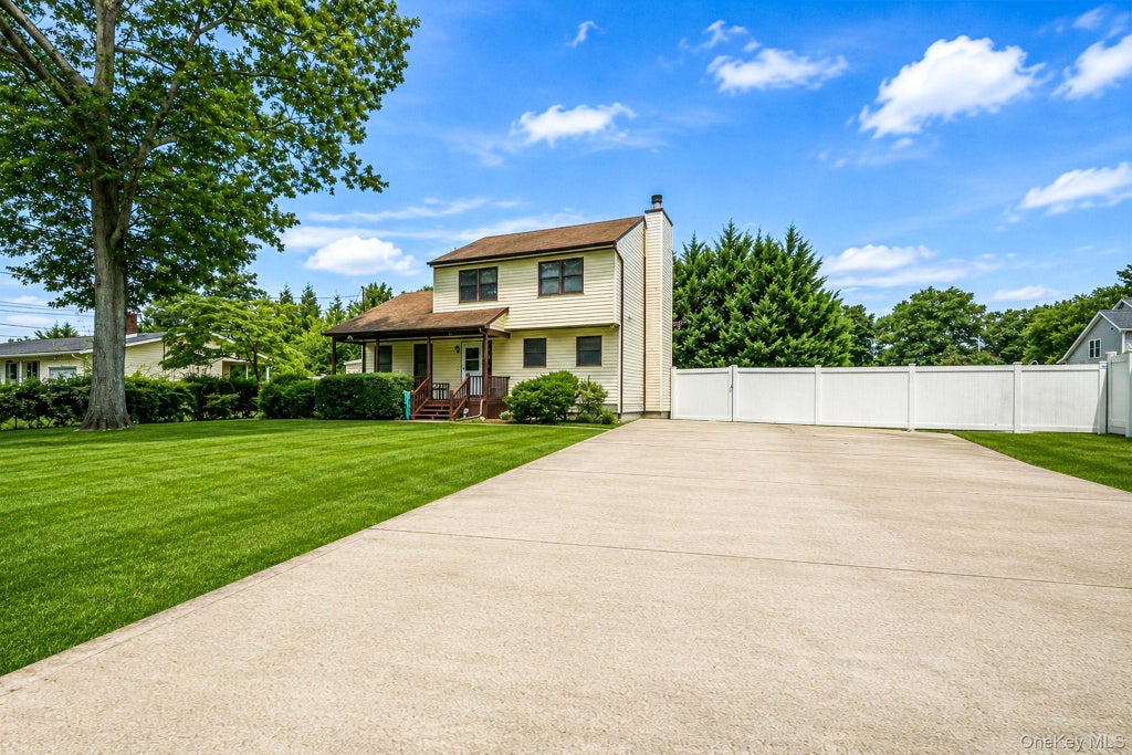 Photo of 14 Roosevelt Avenue, Nesconset, NY 11767 (MLS # 1045135)
