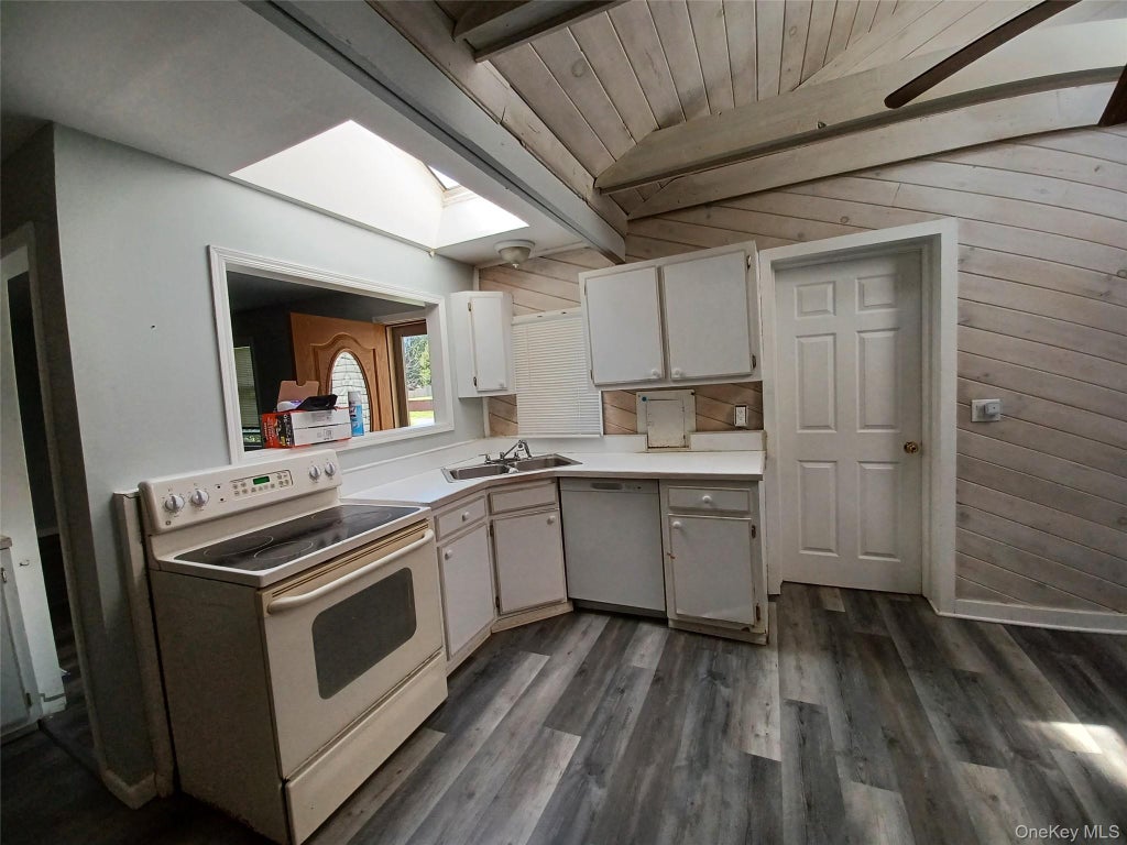 Photo of 77 Dahlia Drive, Mastic Beach, NY 11951 (MLS # 1060074)