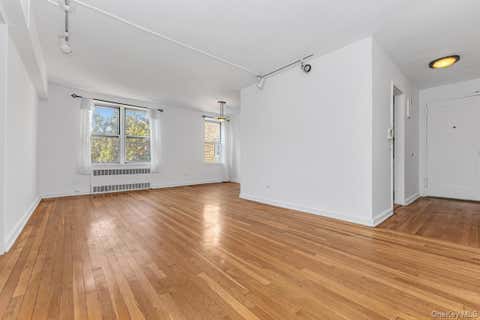 Photo of 105-25 67th Road Rd #4A, Forest Hills, NY 11375 (MLS # 1042176)