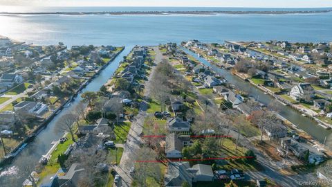 Photo of 14 Whiting Road, East Quogue, NY 11942 (MLS # 937598)