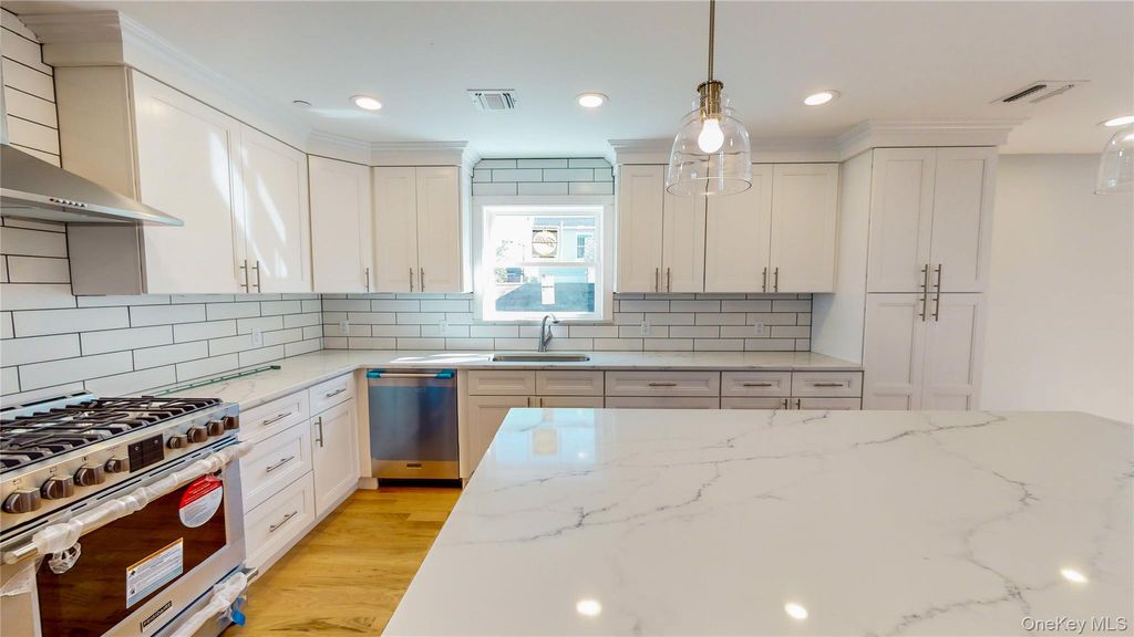 Photo of 54 North Boulevard, East Rockaway, NY 11518 (MLS # 928302)