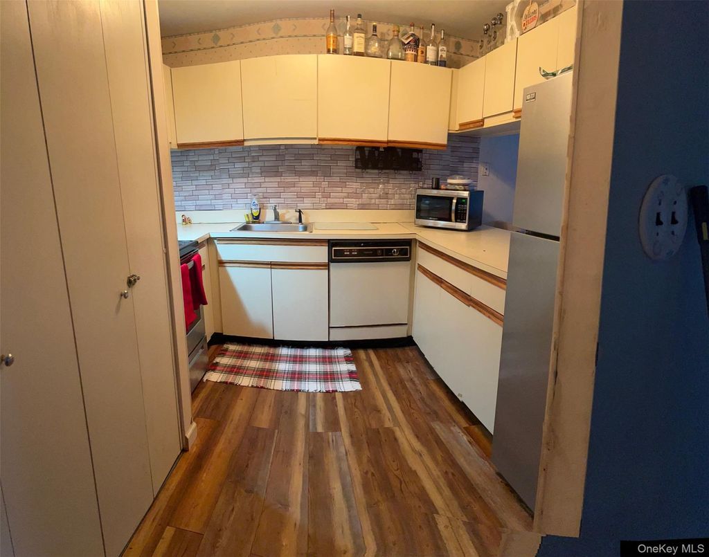 Photo of 590 Haig Street St #101, Baldwin, NY 11510 (MLS # 958855)