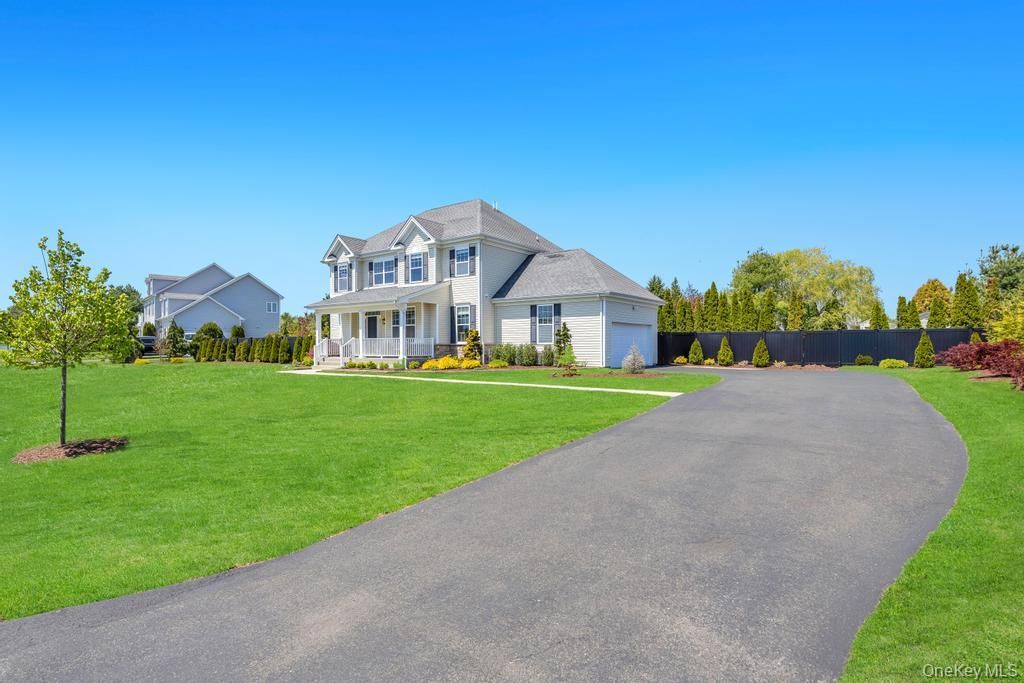 Photo of 25 Maidstone Lane, Wading River, NY 11792 (MLS # 996047)