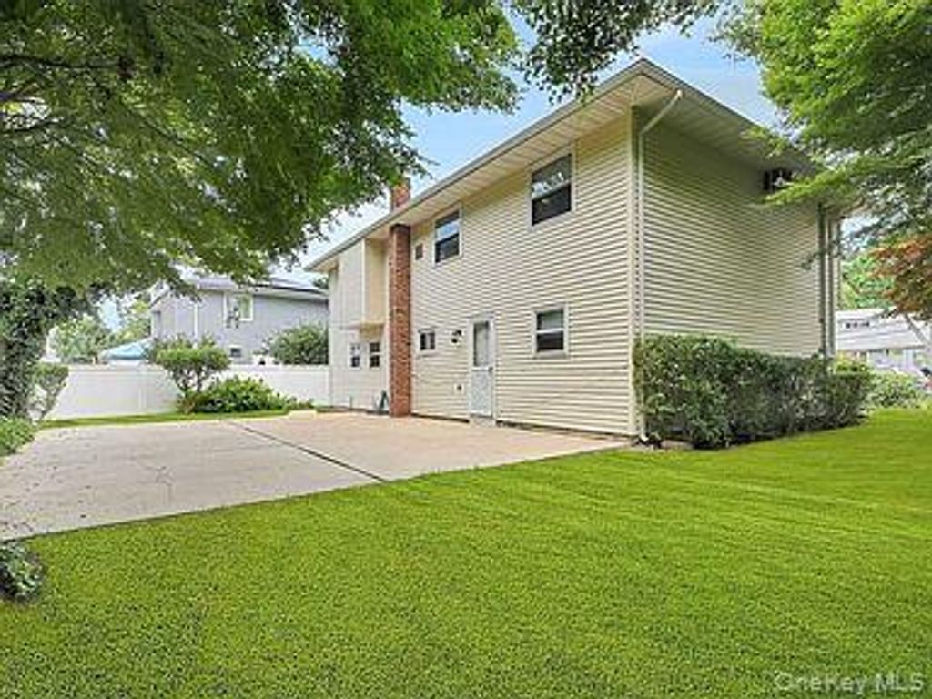 Photo of 24 Spruce Street, Brentwood, NY 11717 (MLS # 997490)