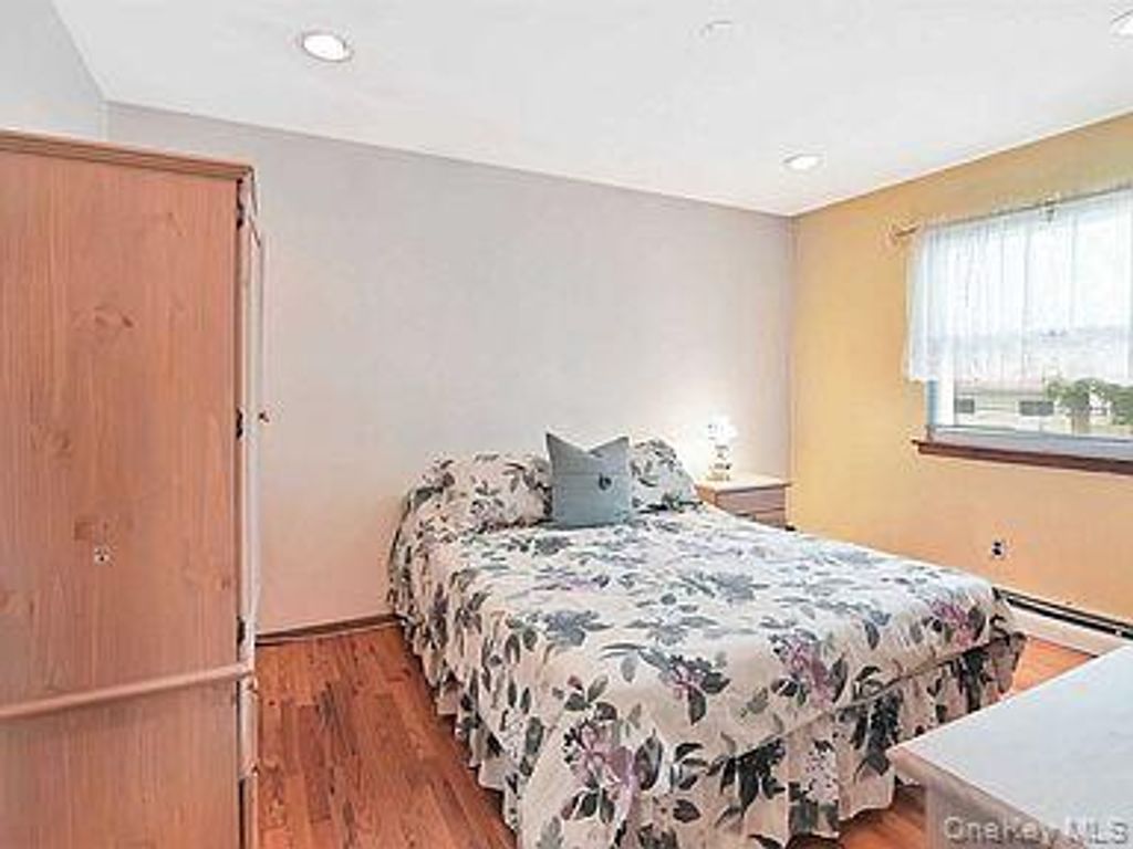Photo of 24 Spruce Street, Brentwood, NY 11717 (MLS # 997490)