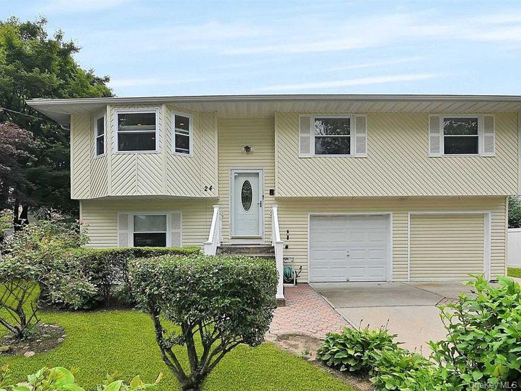 Photo of 24 Spruce Street, Brentwood, NY 11717 (MLS # 997490)