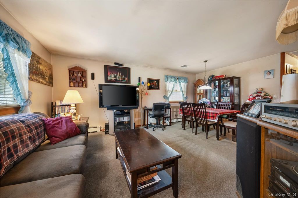 Photo of 25 Woodcut Drive, Mastic Beach, NY 11951 (MLS # 969668)