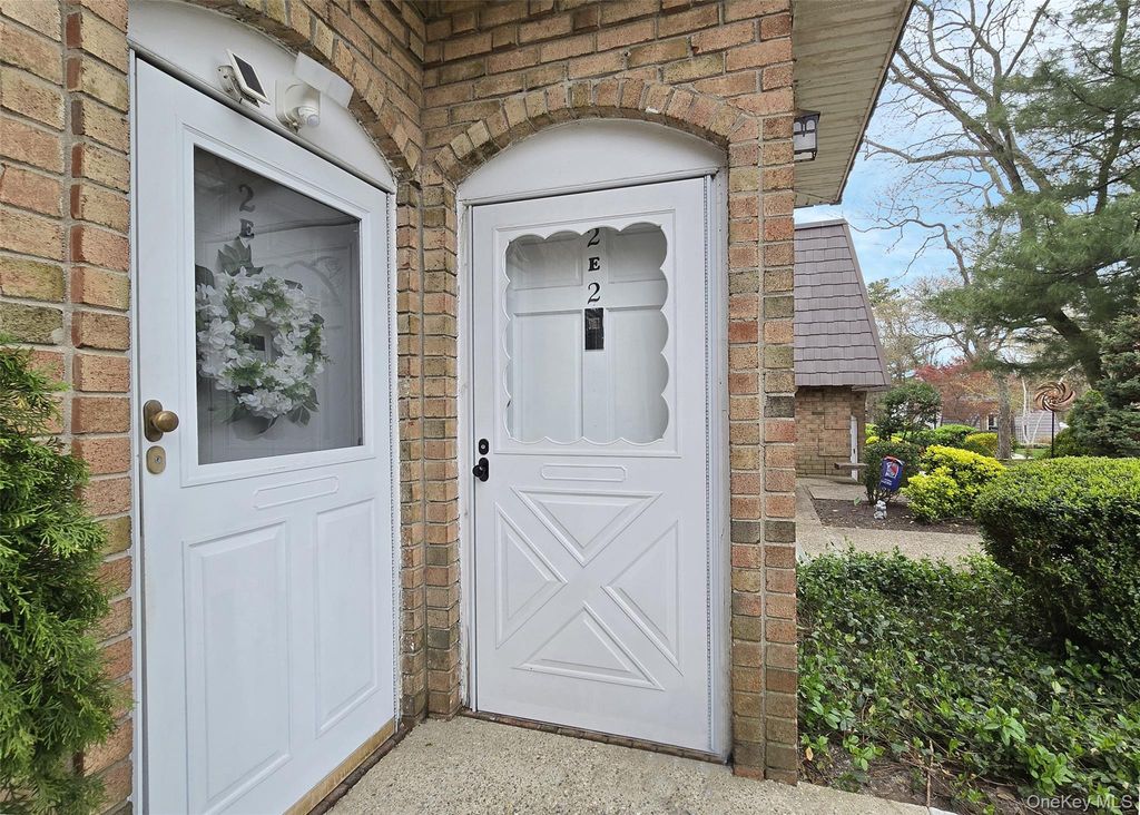 Photo of 655 Middle Country Road #2-2E2, Coram, NY 11727 (MLS # 988585)