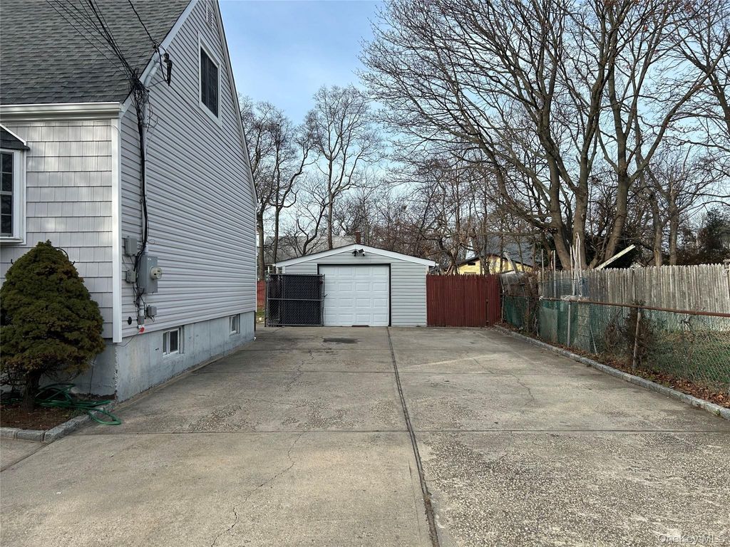 Photo of 49 Doolittle Street, Brentwood, NY 11717 (MLS # 942915)