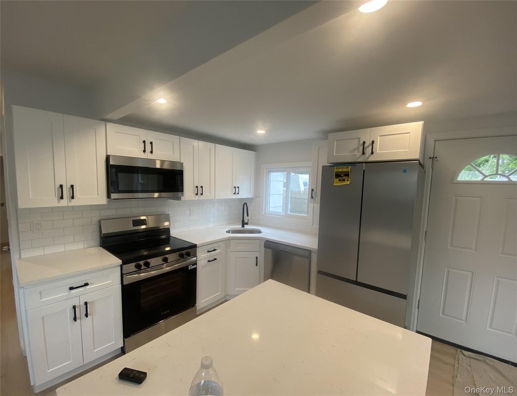 Photo of 181 Cypress Drive, Mastic Beach, NY 11951 (MLS # 1046777)