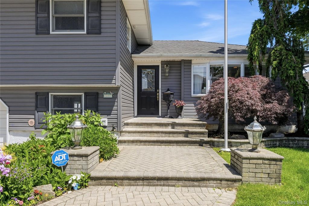 Photo of 453 2nd Avenue, Massapequa Park, NY 11762 (MLS # 1009951)