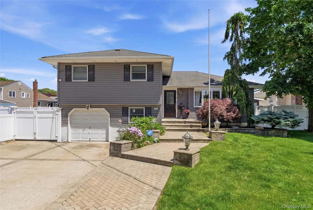 Photo of 453 2nd Avenue, Massapequa Park, NY 11762 (MLS # 1009951)