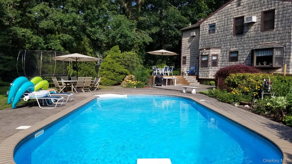 Photo of 17 Gull Dip Road, Ridge, NY 11961 (MLS # 1059537)