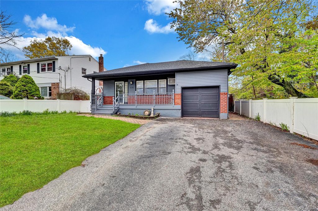 Photo of 66 Phelps Lane, North Babylon, NY 11703 (MLS # 1003206)