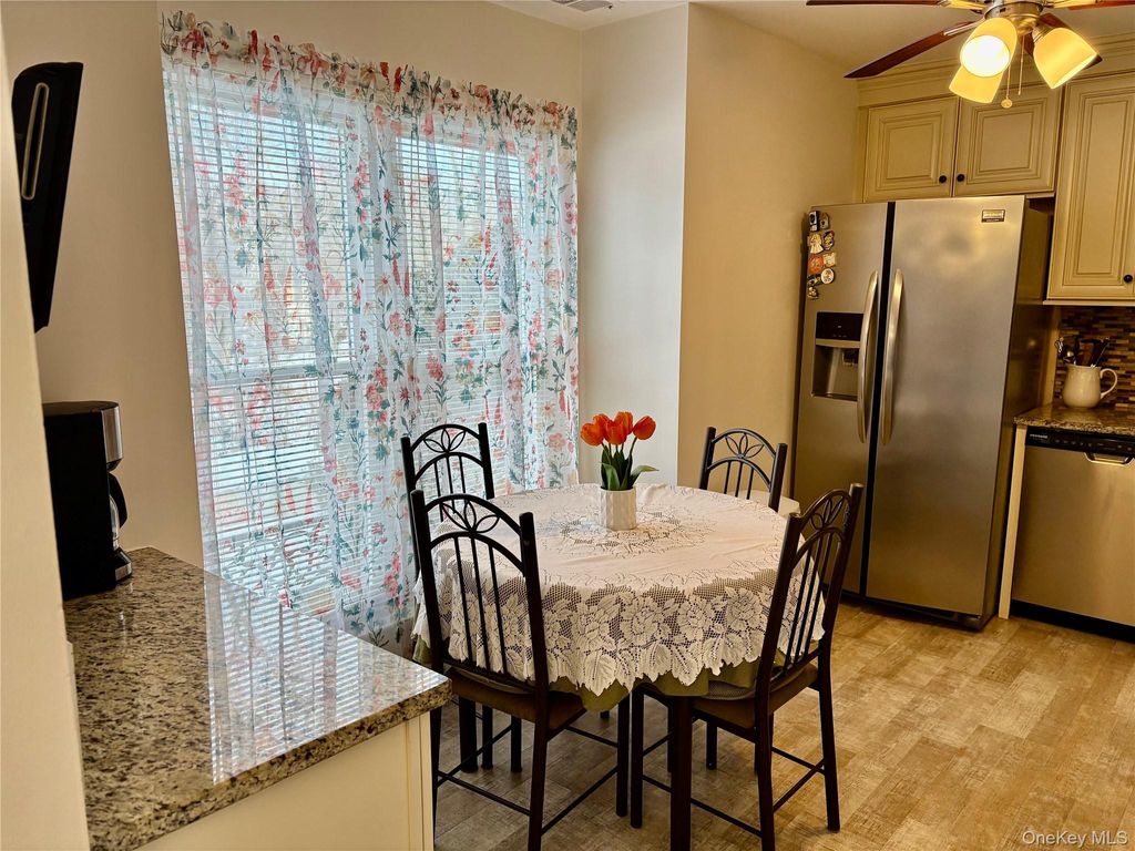 Photo of 9 Willow Ct Ct #9, Selden, NY 11784 (MLS # 967544)