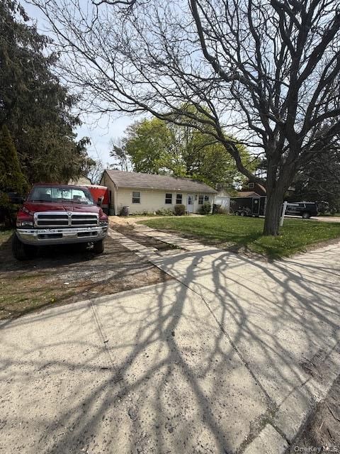 Photo of 511 Wicks Road, Brentwood, NY 11717 (MLS # 989904)