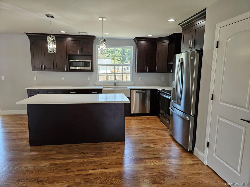 Photo of 13 N. Swezeytown Road, Middle Island, NY 11953 (MLS # 963453)