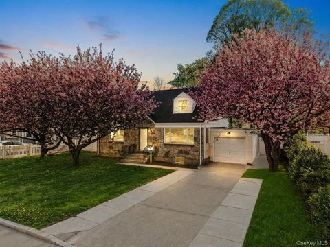 Photo of 355 Sylvan Lane, Westbury, NY 11590 (MLS # 988598)