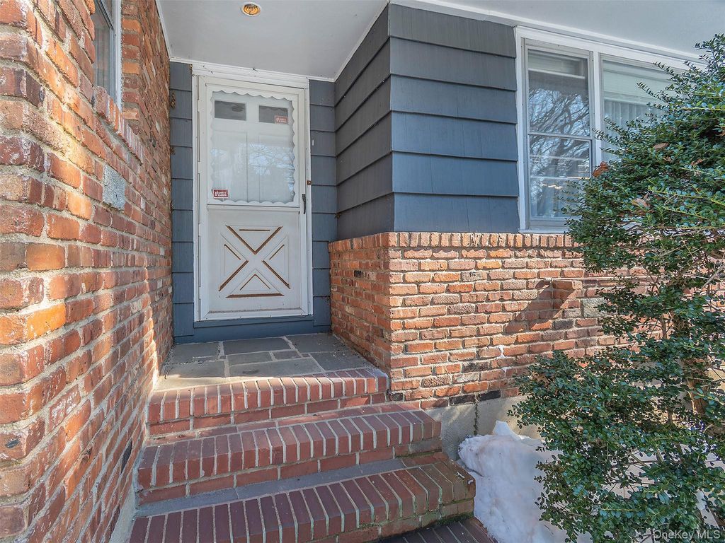 Photo of 856 Glen Cove Avenue, Glen Head, NY 11545 (MLS # 957740)