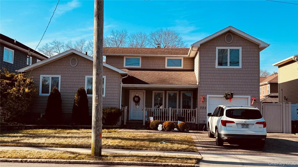 Photo of 320 Roosevelt Avenue, Massapequa Park, NY 11762 (MLS # 952486)