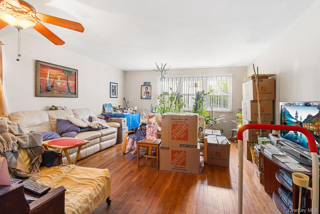 Photo of 12239 Long Street, Jamaica, NY 11434 (MLS # 998085)