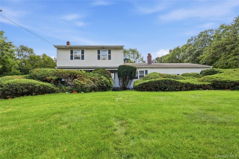 Photo of 124 E Woodside Avenue, Patchogue, NY 11772 (MLS # 1049297)