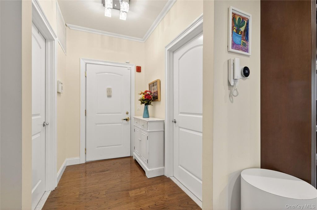 Photo of 556 Pacing Way #556, Westbury, NY 11590 (MLS # 958178)