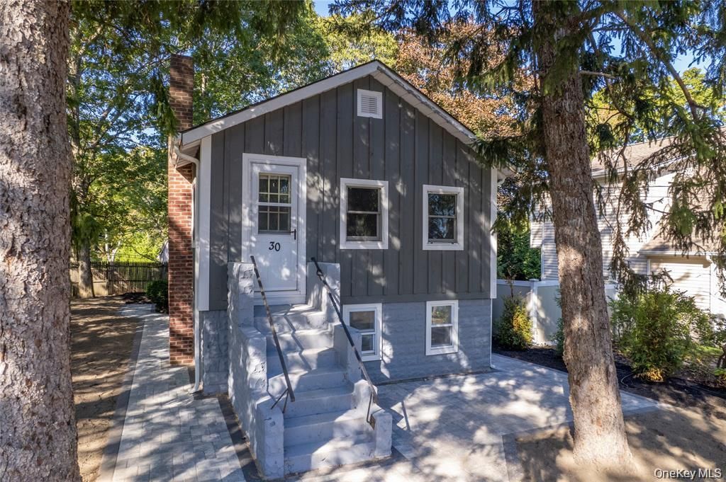 Photo of 30 Long Beach Drive, Sound Beach, NY 11789 (MLS # 923327)