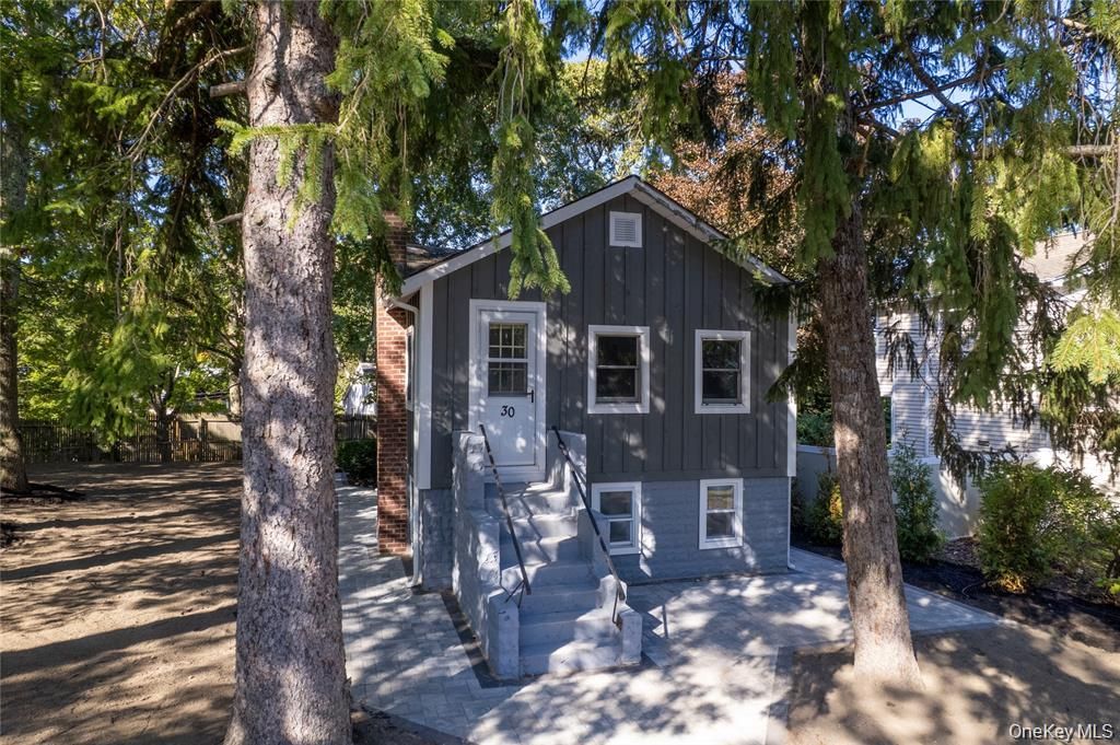 Photo of 30 Long Beach Drive, Sound Beach, NY 11789 (MLS # 923327)