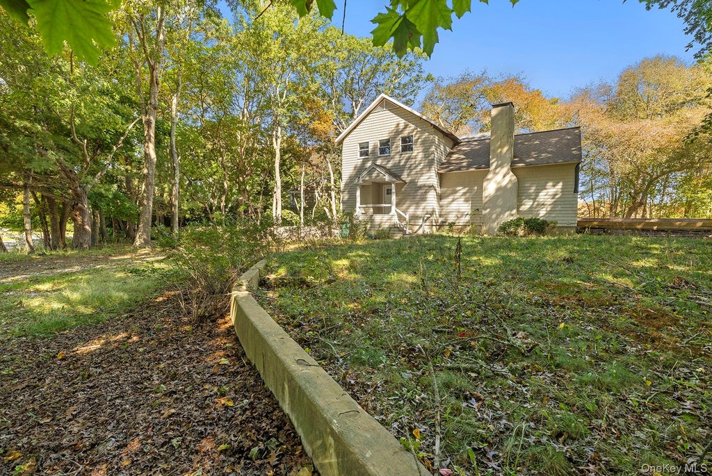 Photo of 203 Head Of Pond Road, Water Mill, NY 11976 (MLS # 1062749)