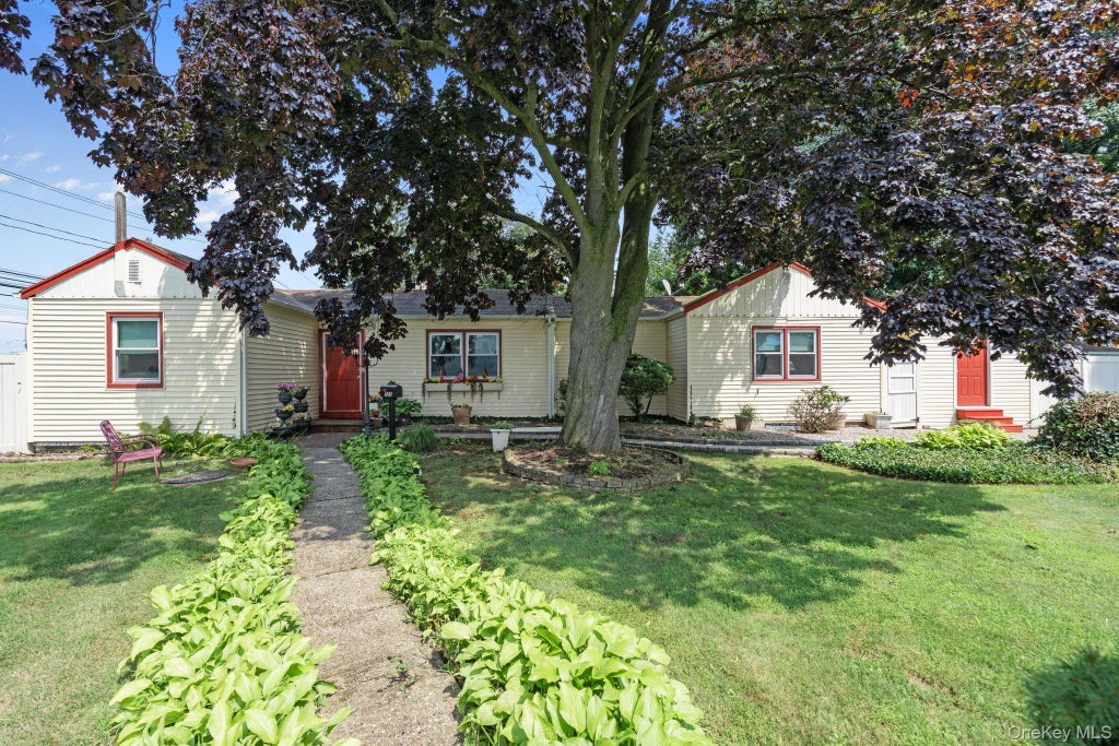 Photo of 125 1st Street, Brentwood, NY 11717 (MLS # 1056927)