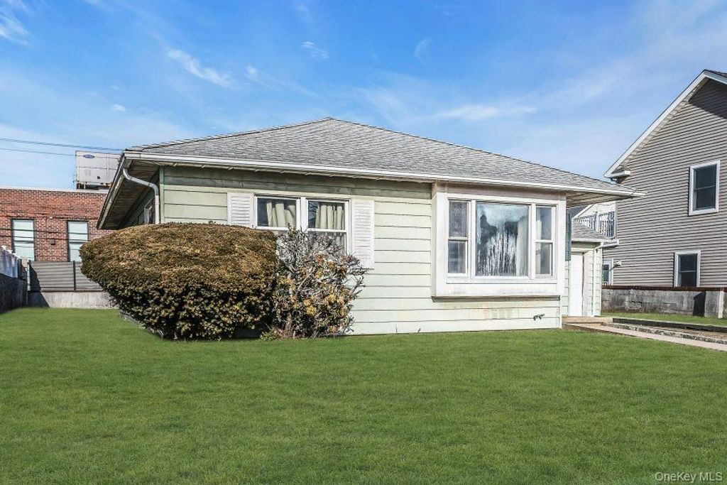 Photo of 545 W Olive Street, Long Beach, NY 11561 (MLS # 950403)