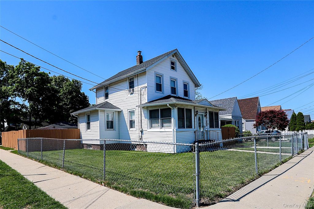 Photo of 110 E Roosevelt Avenue, Roosevelt, NY 11575 (MLS # 1002406)