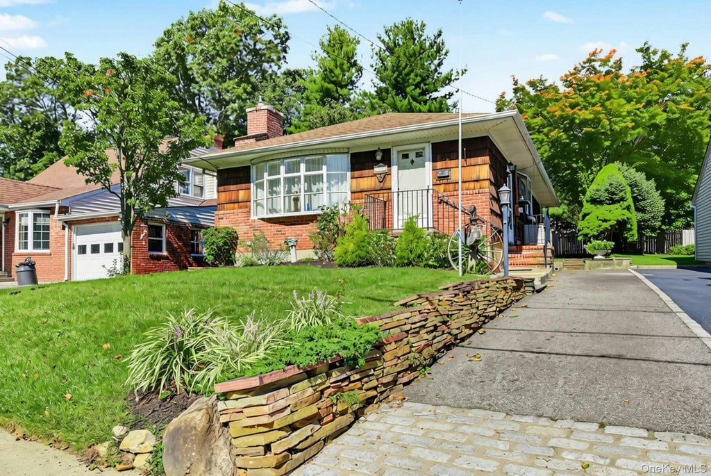 Photo of 112 North Street, Locust Valley, NY 11560 (MLS # 1054854)