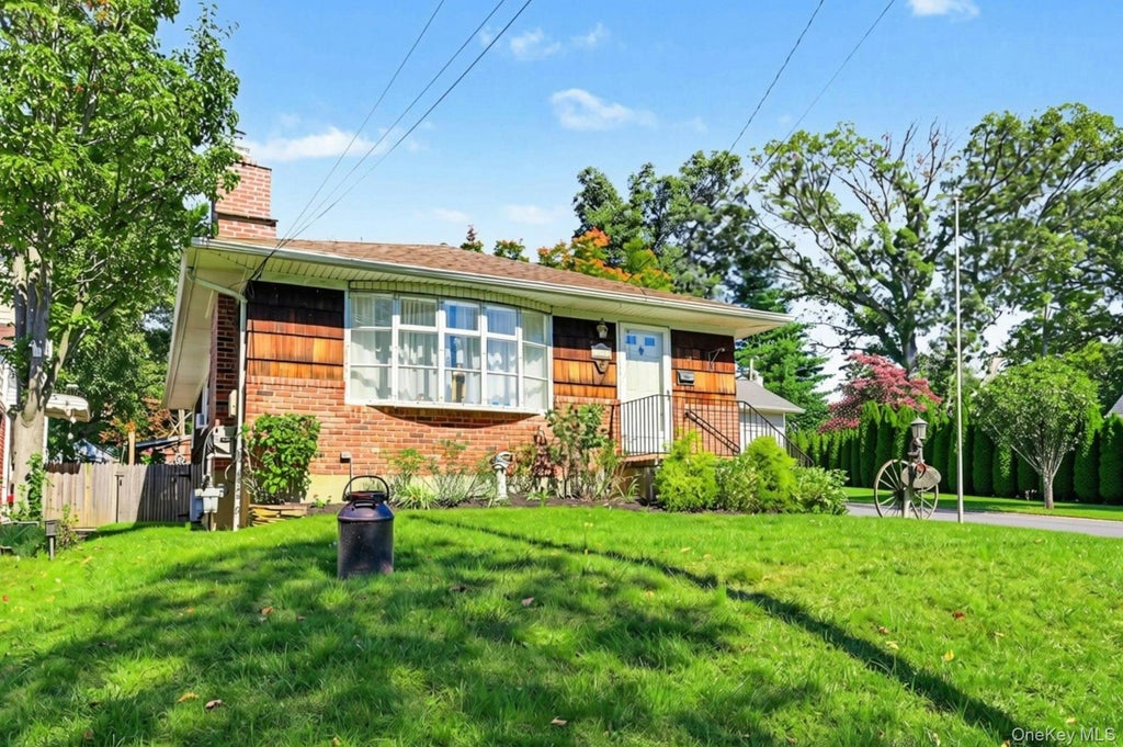 Photo of 112 North Street, Locust Valley, NY 11560 (MLS # 1054854)