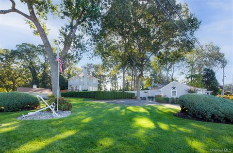 Photo of 1 Canal Road, Hampton Bays, NY 11946 (MLS # 922491)