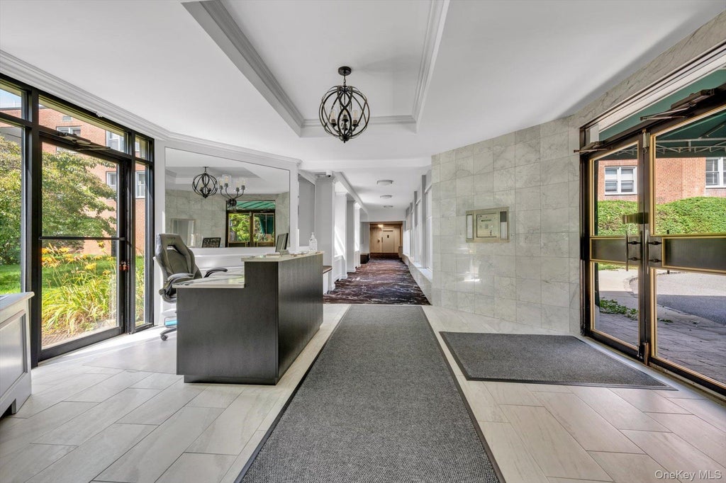 Photo of 1390 Broadway #104, Hewlett, NY 11557 (MLS # 1064514)