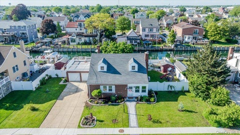 Homes For Sale - 48 W 3rd Street<br/> Freeport, NY 11520