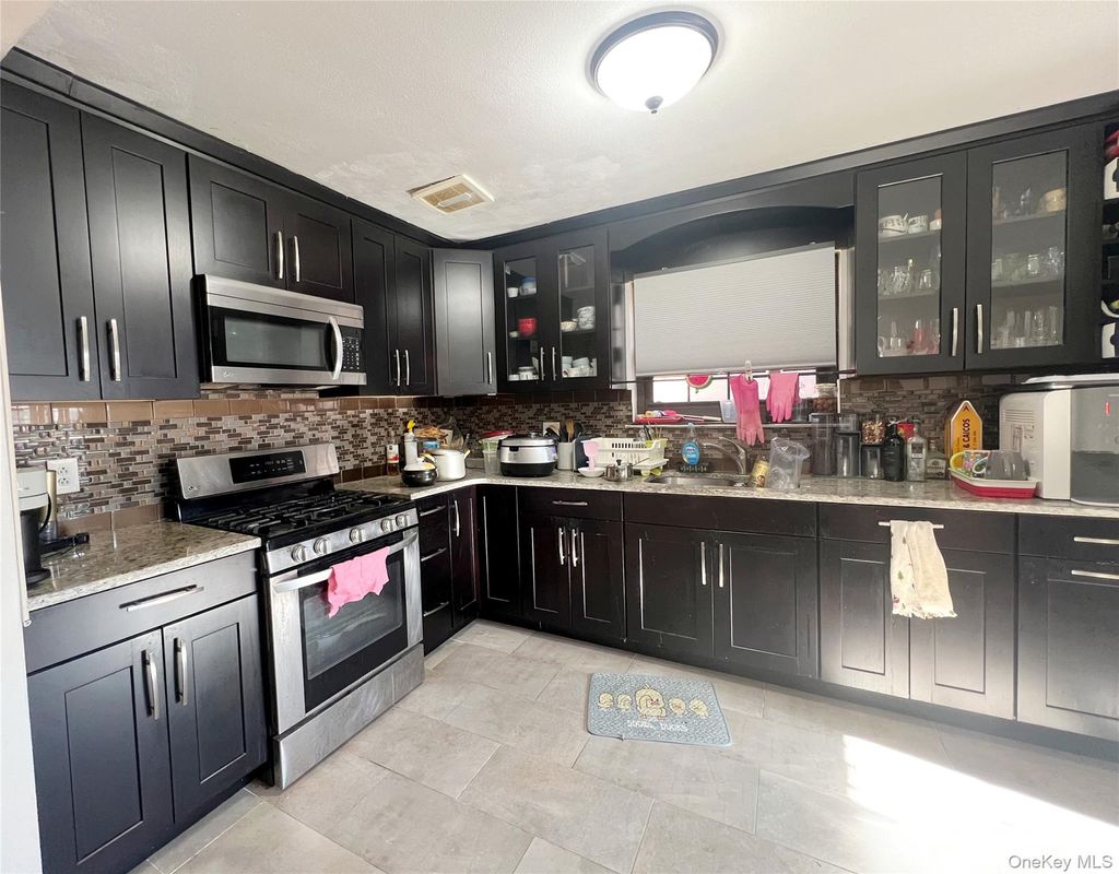 Photo of 21974 64th Avenue #239, Oakland Gardens, NY 11364 (MLS # 943149)