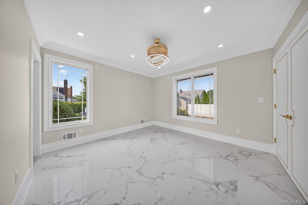Photo of 946 Cherry Lane, Garden City Park, NY 11001 (MLS # 1020350)