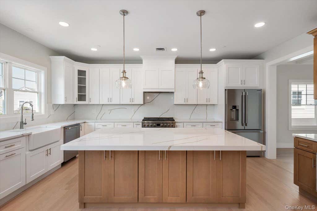 Photo of 17 Island Parkway N PKWY, Island Park, NY 11558 (MLS # 1021723)