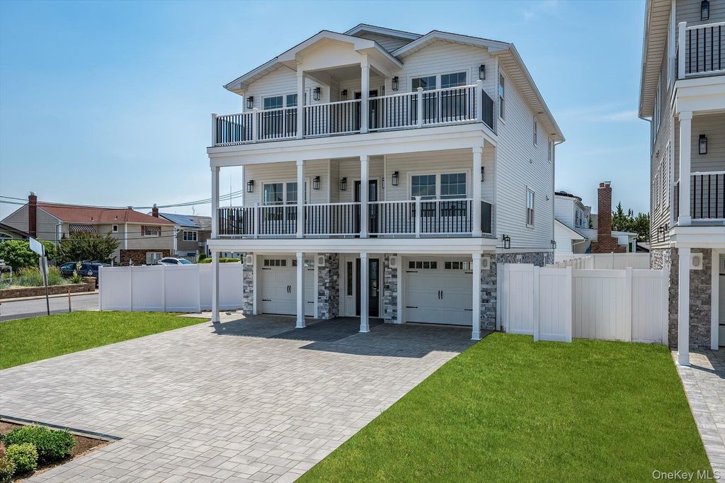 Photo of 17 Island Parkway N PKWY, Island Park, NY 11558 (MLS # 1021723)