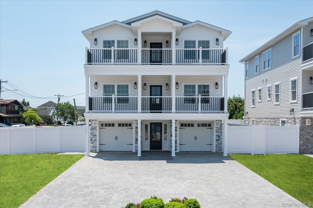 Photo of 17 Island Parkway N PKWY, Island Park, NY 11558 (MLS # 1021723)