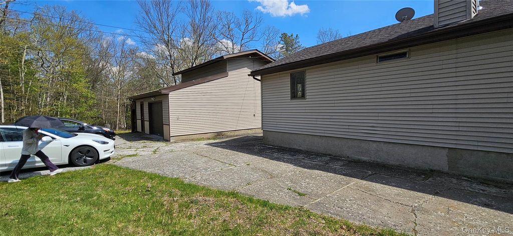 Photo of 87 W Peenpack Trail, Sparrowbush, NY 12780 (MLS # 995565)