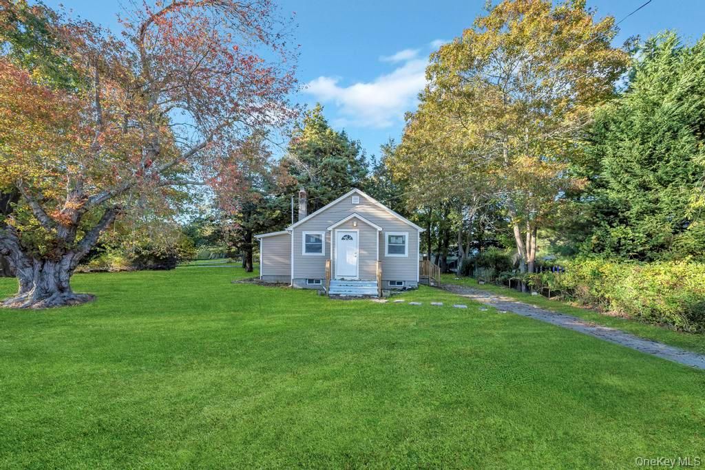 Photo of 231 Elm Road W, Mastic Beach, NY 11951 (MLS # 951886)